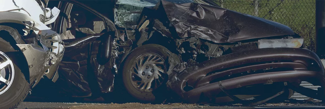 two destroyed cars after an accident, banner